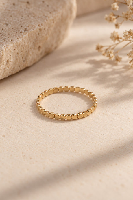 Bhutan ring on a pale stone surface